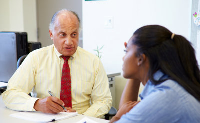 young female talking to a man